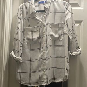 White long sleeve button up with black plaid and double breast pocket.